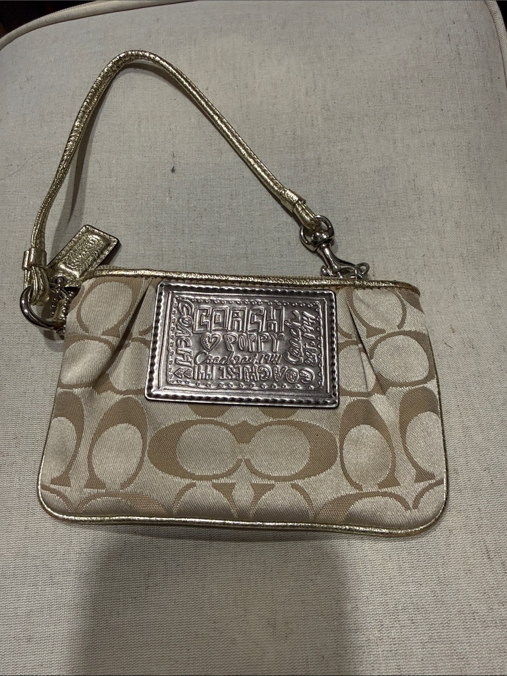 COACH Beige Signature Wristlet with Metallic Gold Trim